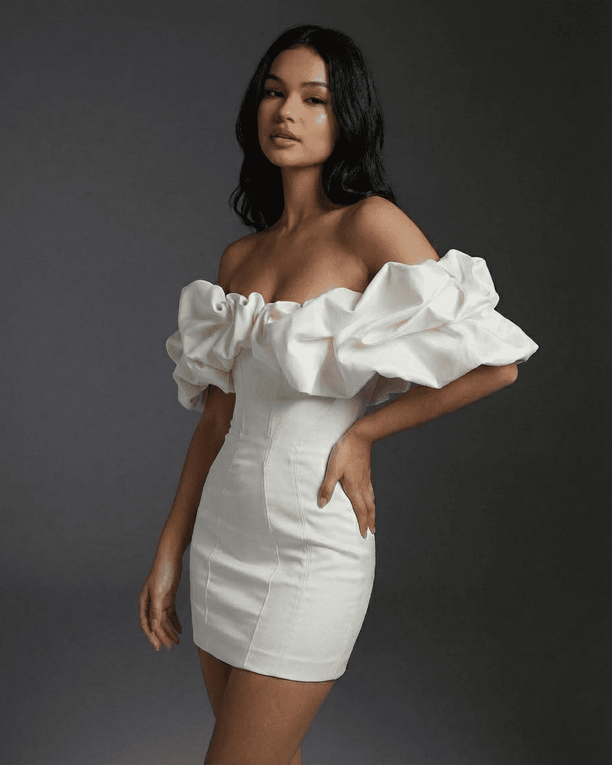 Celeste Mini Dress by Lauven featuring off-the-shoulder design with ruffle trim and a fitted silhouette.