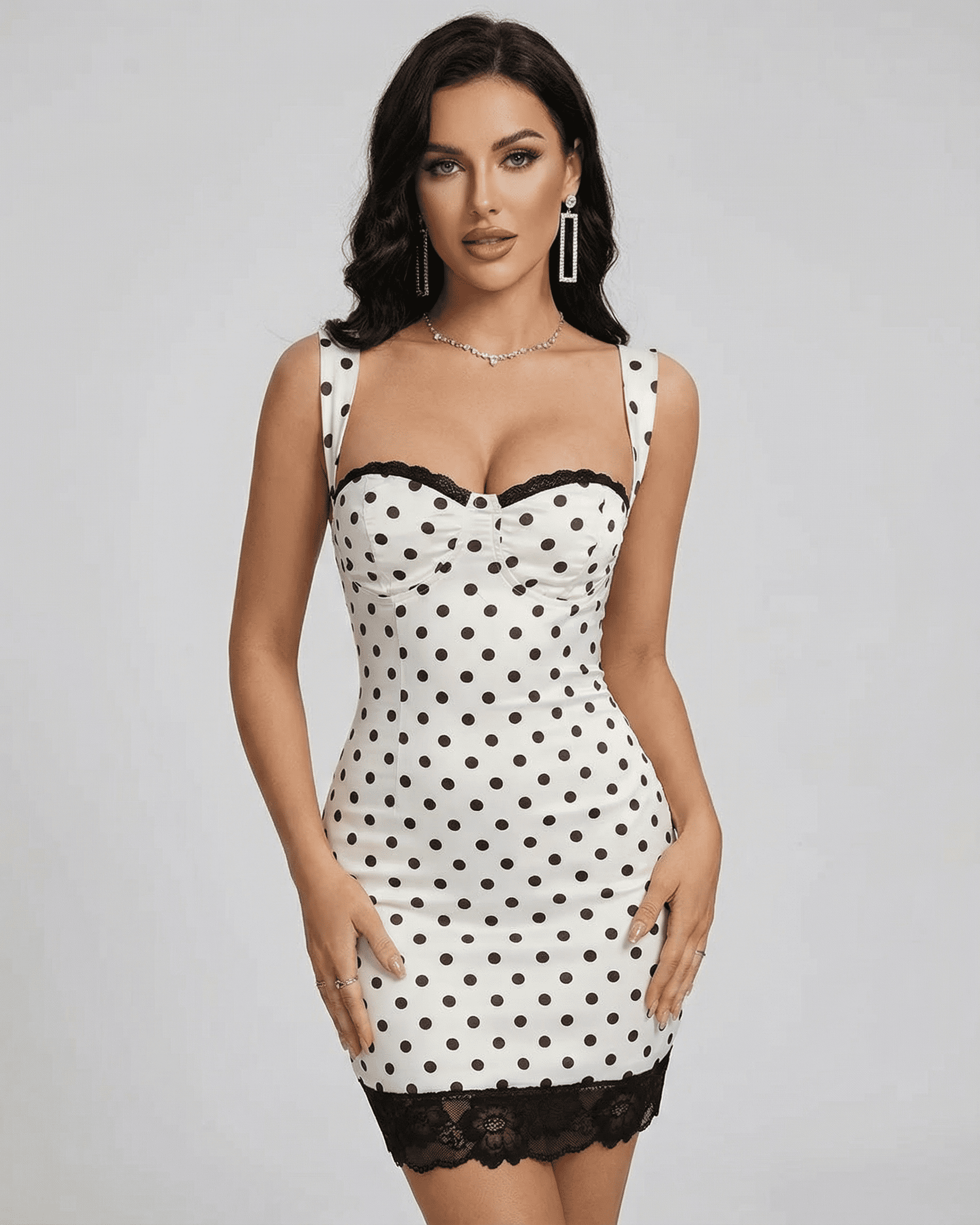 Celeste Mini Dress by Lauven - Polka dot mini dress with lace trim and high waist, perfect for a vintage-inspired look.