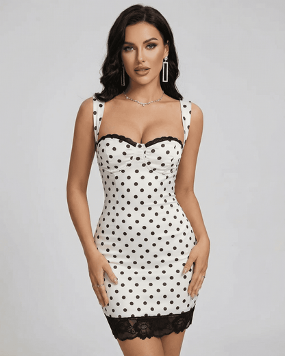 Celeste Mini Dress by Lauven - Polka dot mini dress with lace trim and high waist, perfect for a vintage-inspired look.