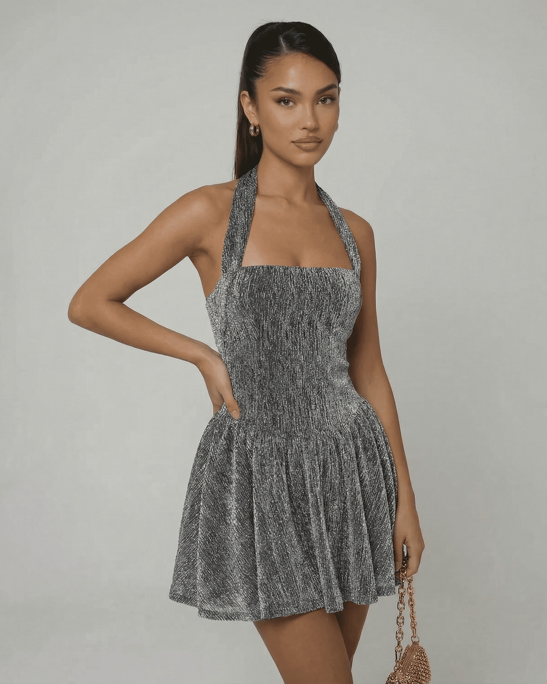 Celeste Mini Dress by Lauven featuring a shimmering sequin A-line silhouette with a high waist finish.