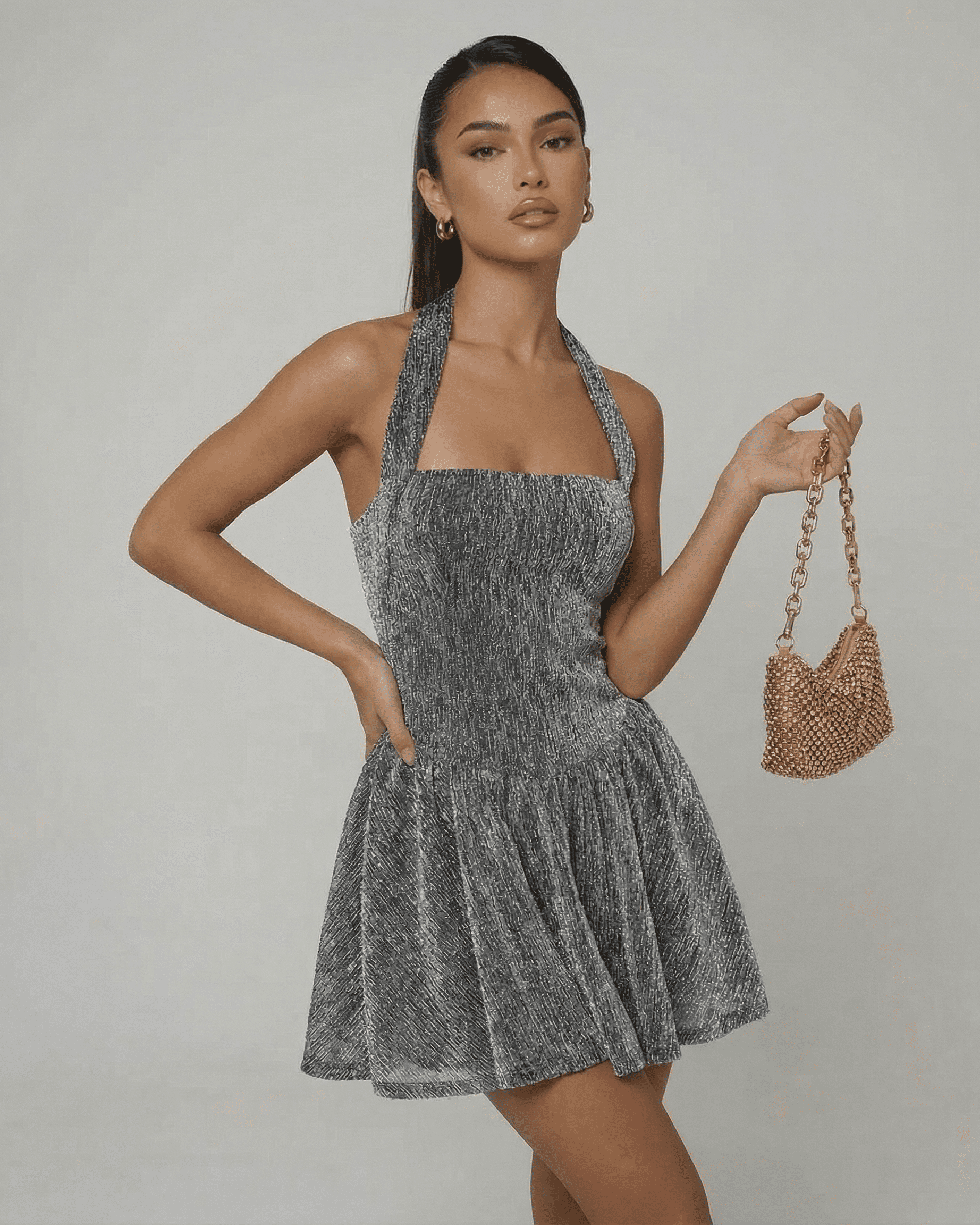 Celeste Mini Dress by Lauven features a shimmering sequin texture with a structured A-line silhouette.