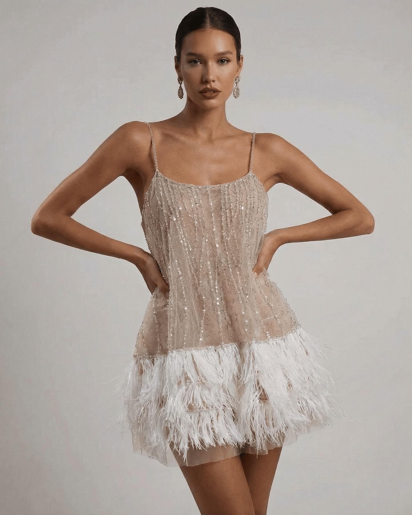 Celeste Mini Dress by Lauven featuring sequin tulle and feather tassel hem, perfect for fairycore style.