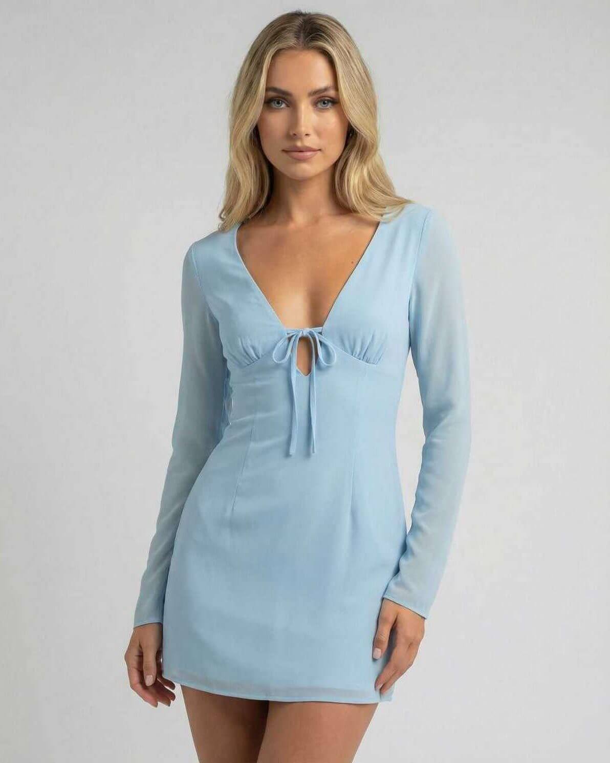 Celeste Mini Dress by Lauven in soft blue featuring a V-neckline and sheer long sleeves, perfect for a chic look.