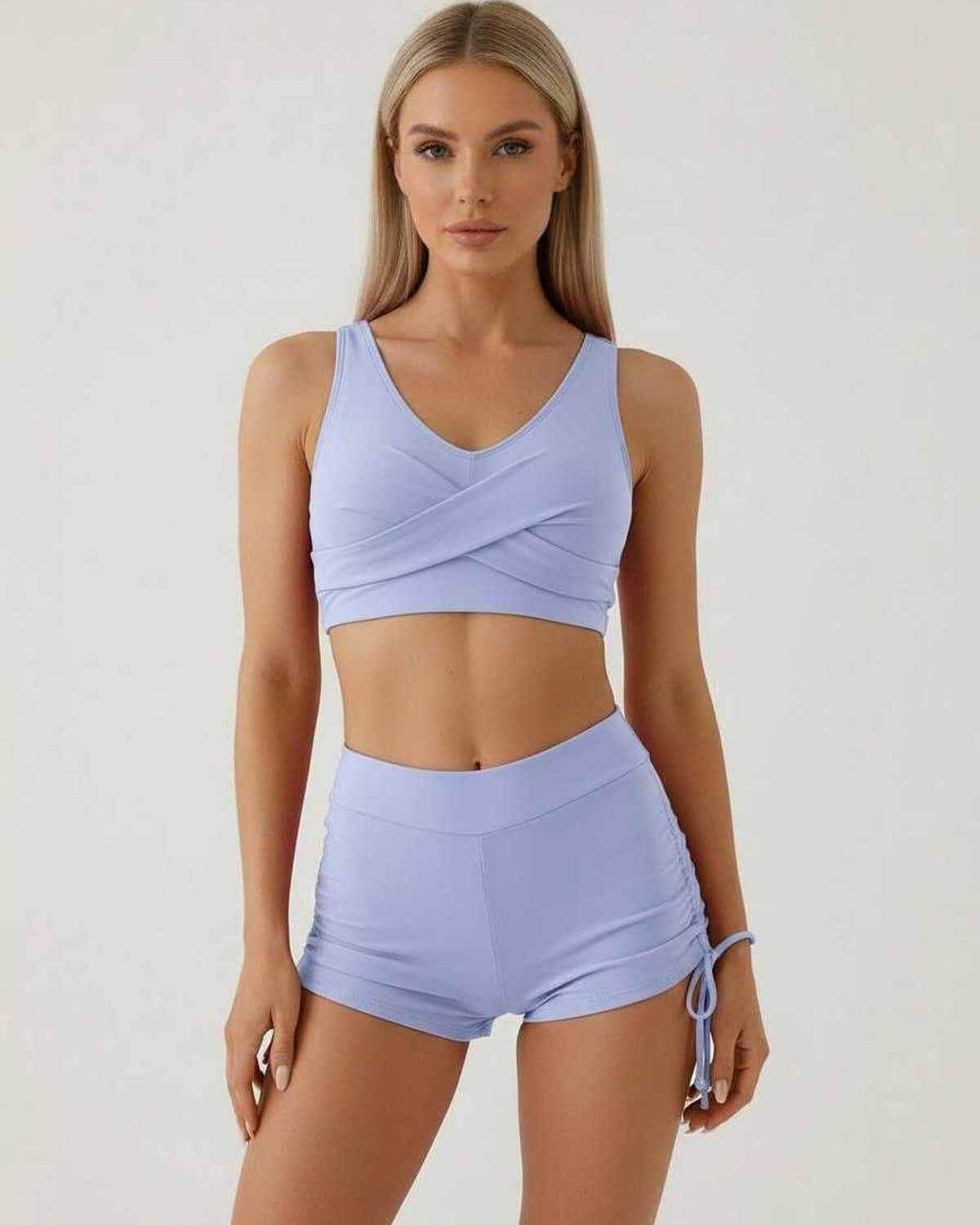 Celeste Set by Lauven - Elegant blue women's two-piece with sleeveless crop top and high waist shorts.