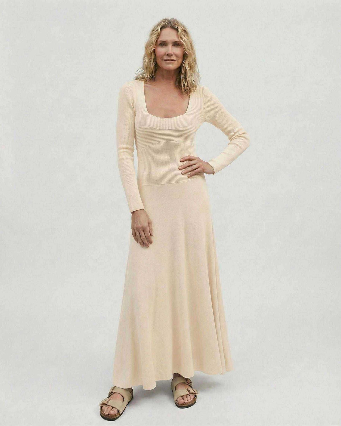 Lauven Champagne Maxi Dress features a long sleeve square neck design and pleated skirt perfect for elegant occasions.