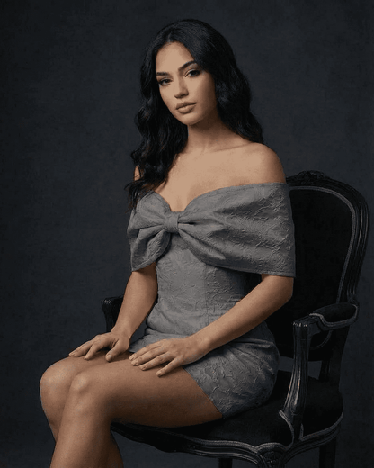 Lauven Charcoal Mini Dress featuring an elegant off-the-shoulder bowknot and a flattering A-line silhouette.