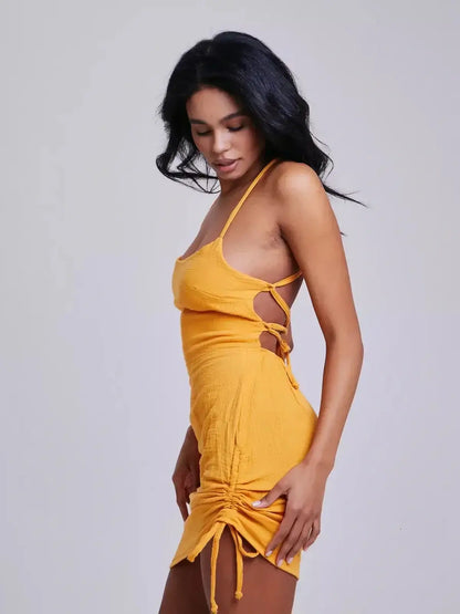 Lauven Citrus Rush summer dress in yellow, showcasing adjustable crisscross straps and a flattering bodycon silhouette.