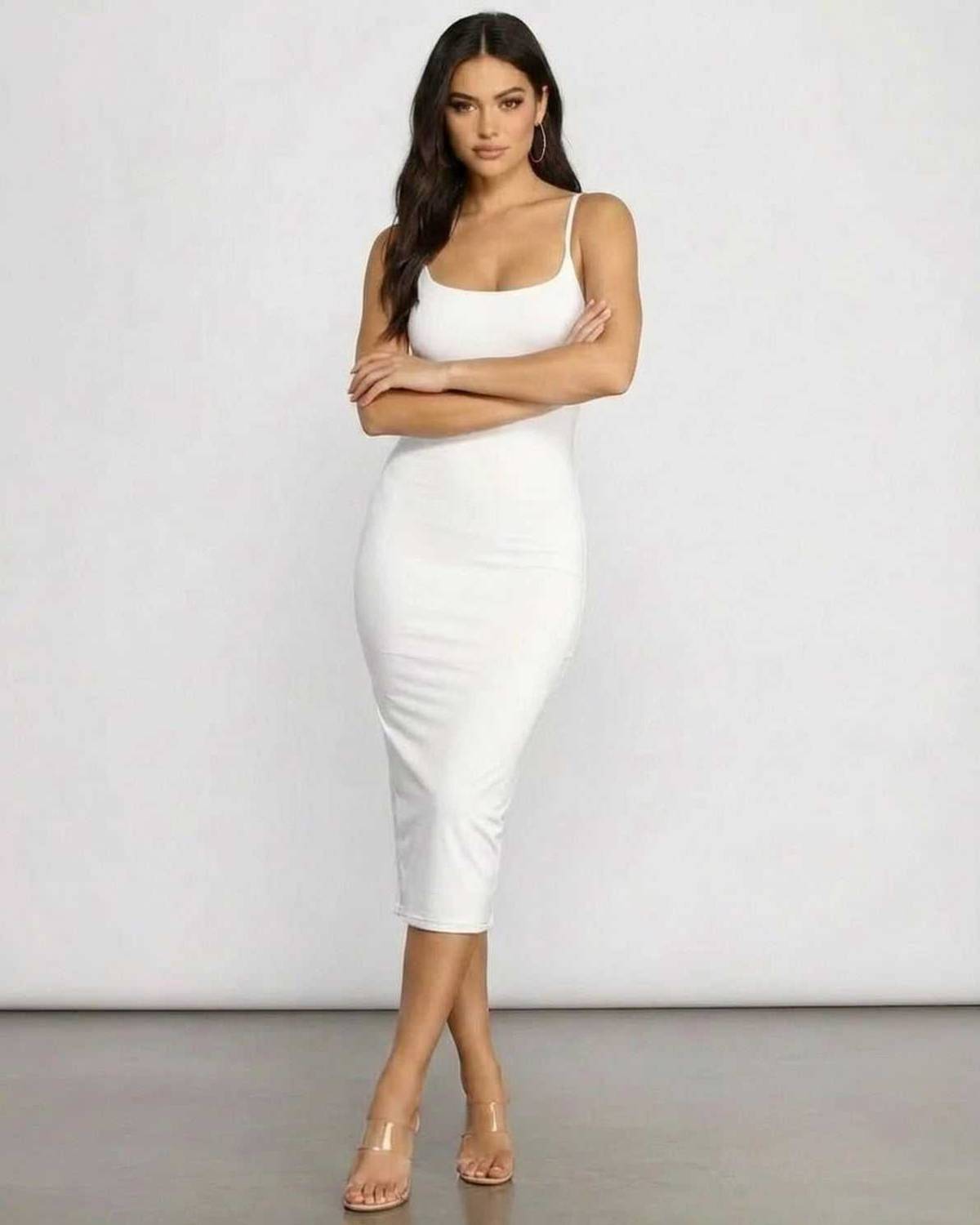 Clara Midi Dress by Lauven, showcasing a timeless white knit with a sleek silhouette, perfect for elegant occasions.