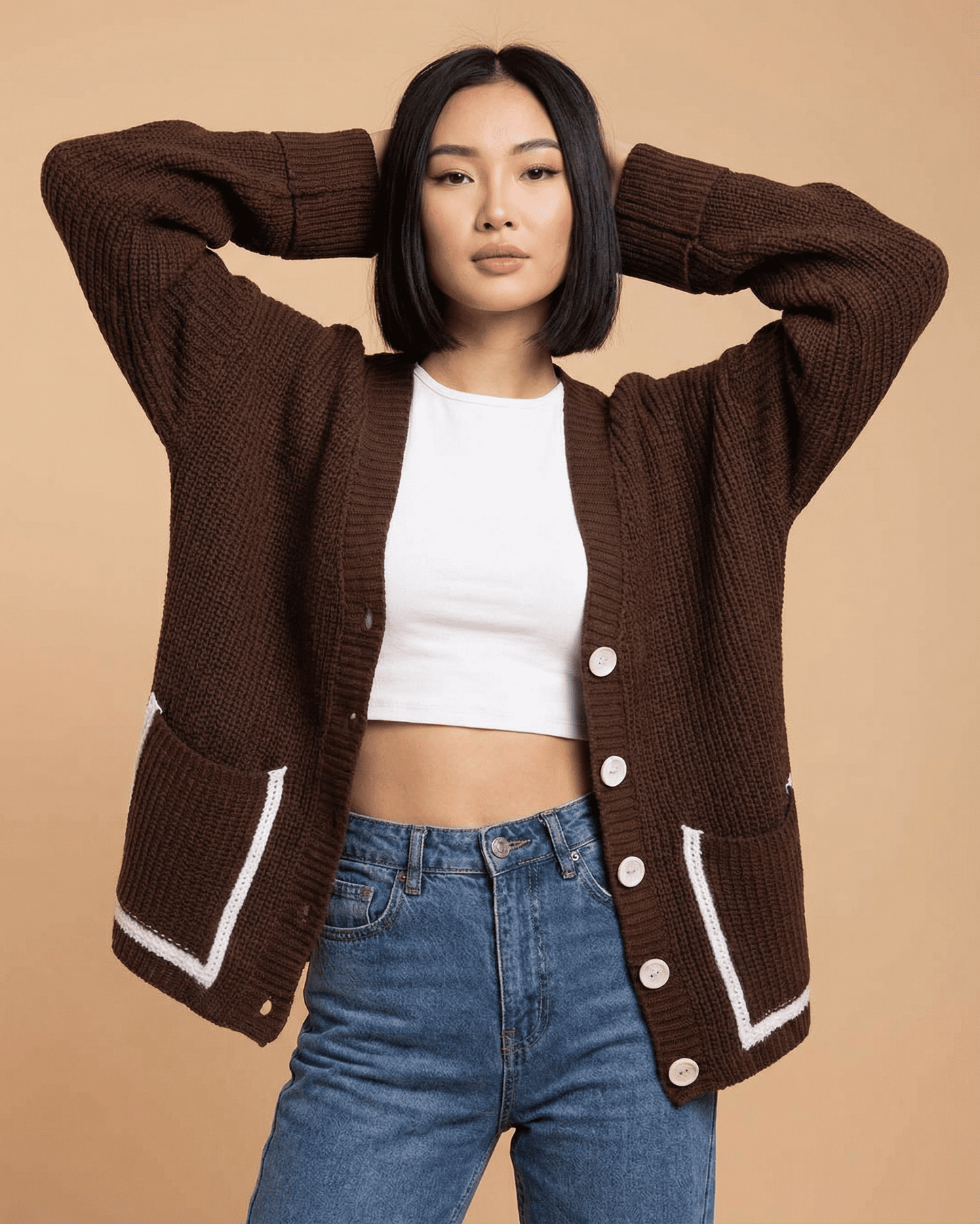 Cocoa Cardigan by Lauven featuring a relaxed silhouette and modern color blocking, styled with a white top and denim.