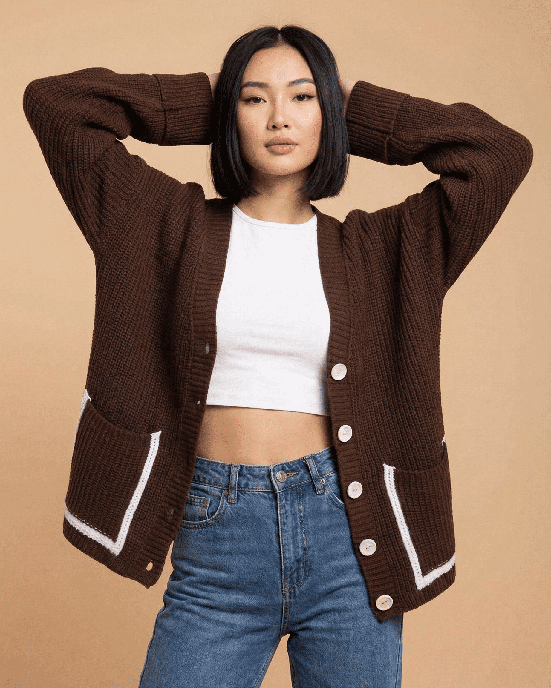 Cocoa Cardigan by Lauven featuring a relaxed silhouette and modern color blocking, styled with a white top and denim.