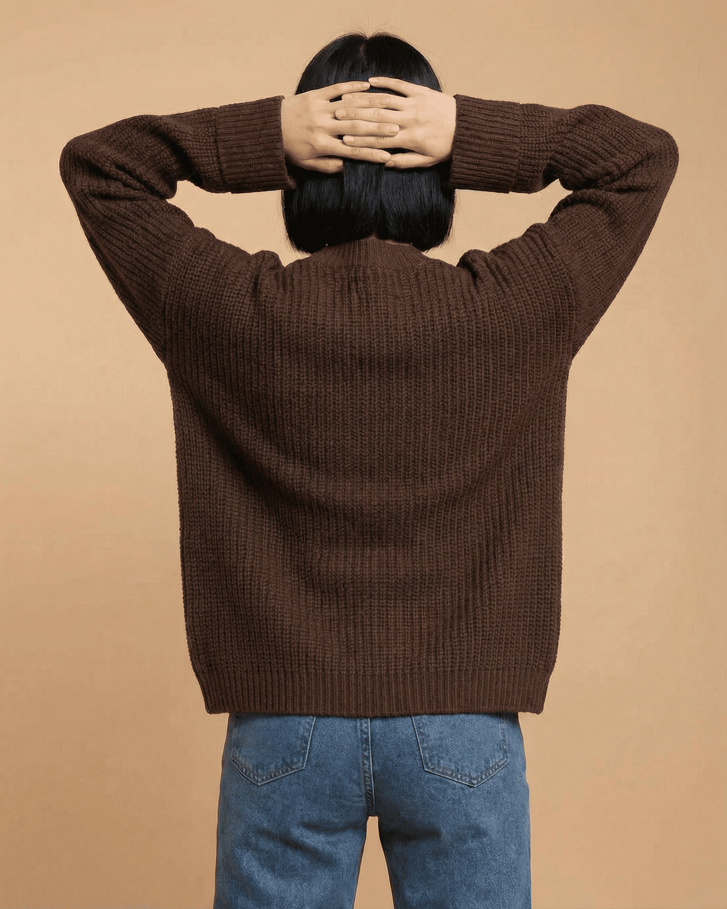 Cocoa Cardigan by Lauven displayed from the back, showcasing its cozy knit texture and relaxed fit.