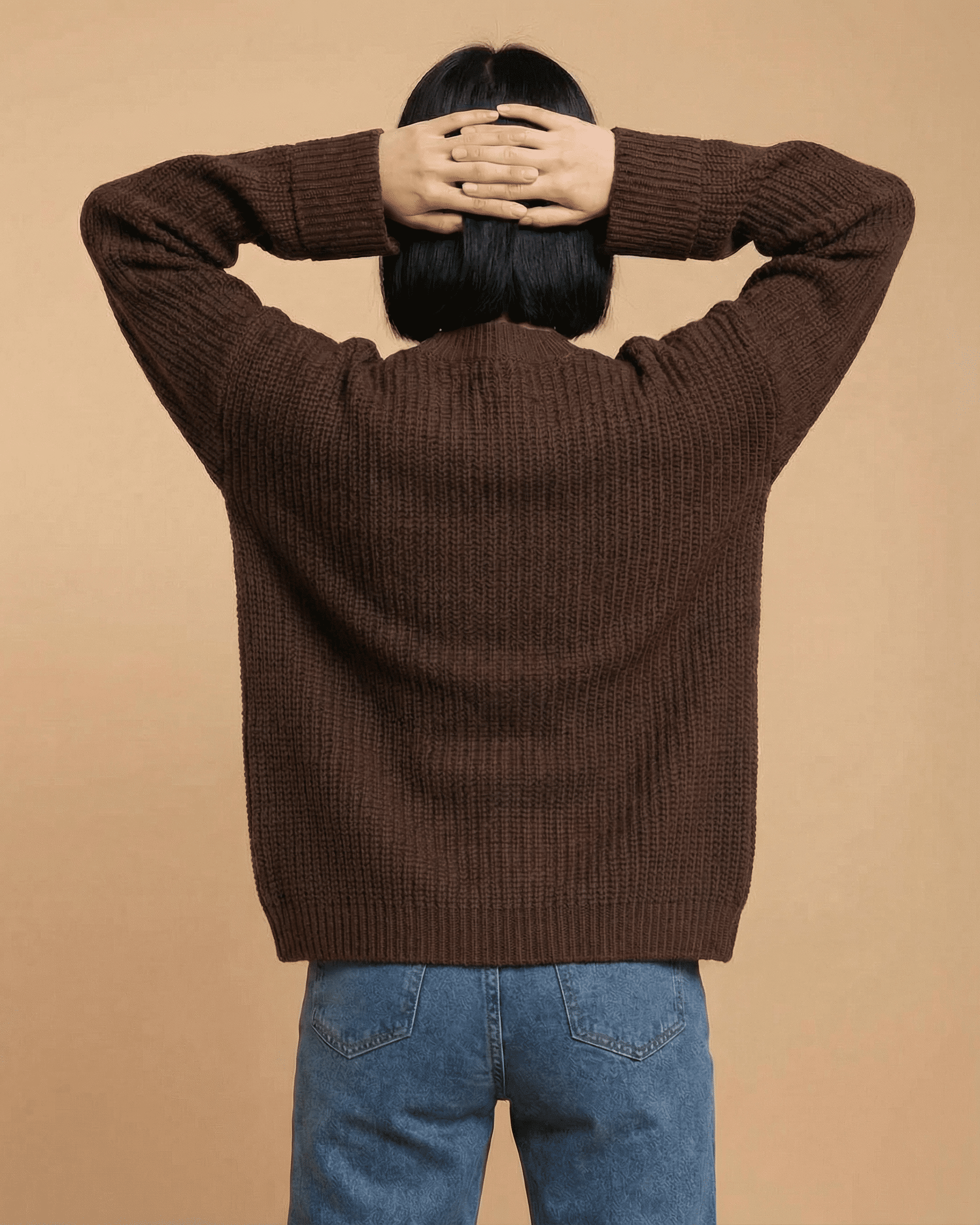 Cocoa Cardigan by Lauven displayed from the back, showcasing its cozy knit texture and relaxed fit.