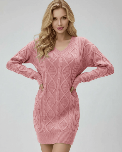 Dahlia Mini Dress by Lauven in soft pink, featuring a ribbed V-neck and cable-knit design for cozy elegance.