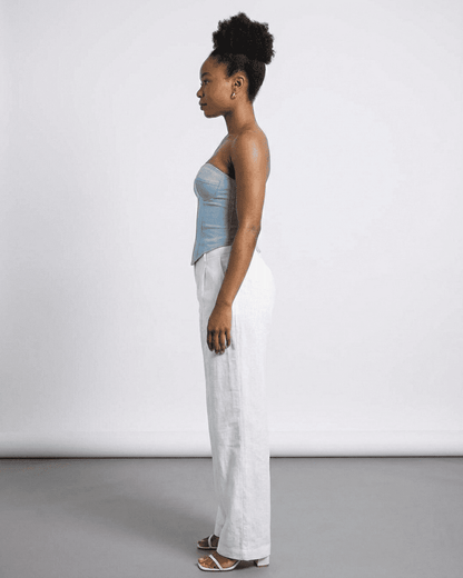 Denali Corset Top by Lauven, showcasing a blue faux denim cup bustier in a side profile view.