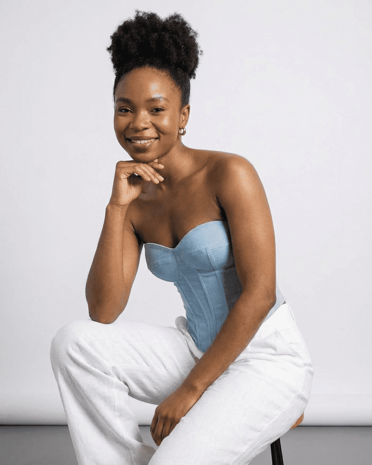 Denali Corset Top by Lauven in faux denim, featuring structured slim design and a modern bustier style.