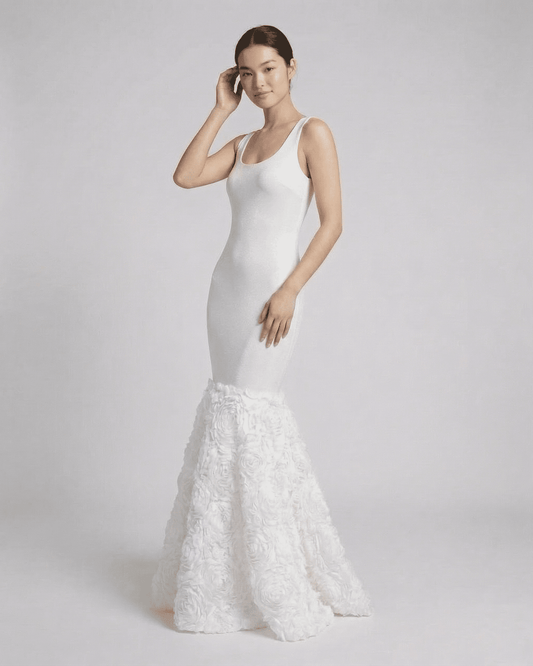 Eirene Maxi Dress by Lauven, women's sleeveless white dress with textured rosette hem, showcasing modern elegance.