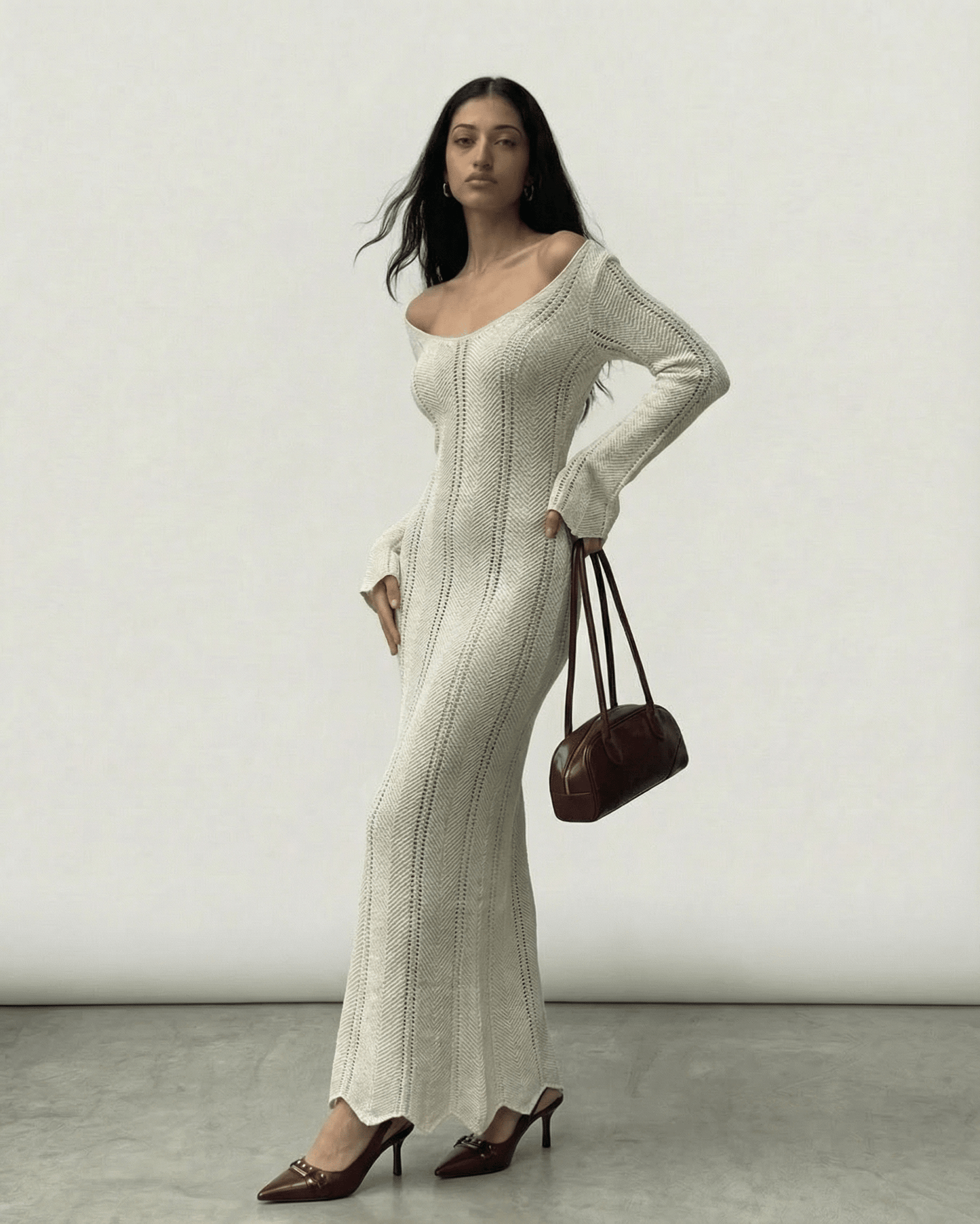 Elara Maxi Dress by Lauven, ribbed V-neck bodycon silhouette with long flare sleeves.