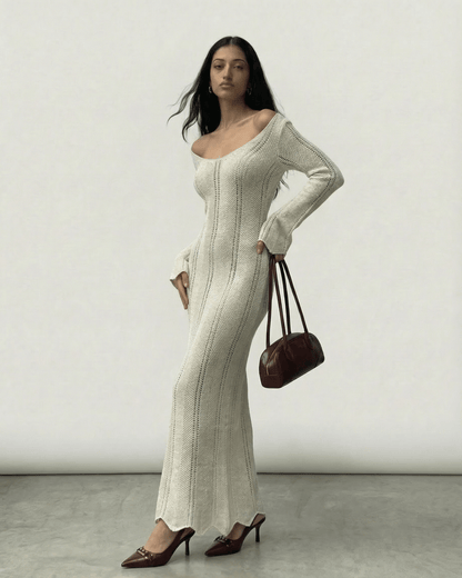 Elara Maxi Dress by Lauven, ribbed V-neck bodycon silhouette with long flare sleeves.