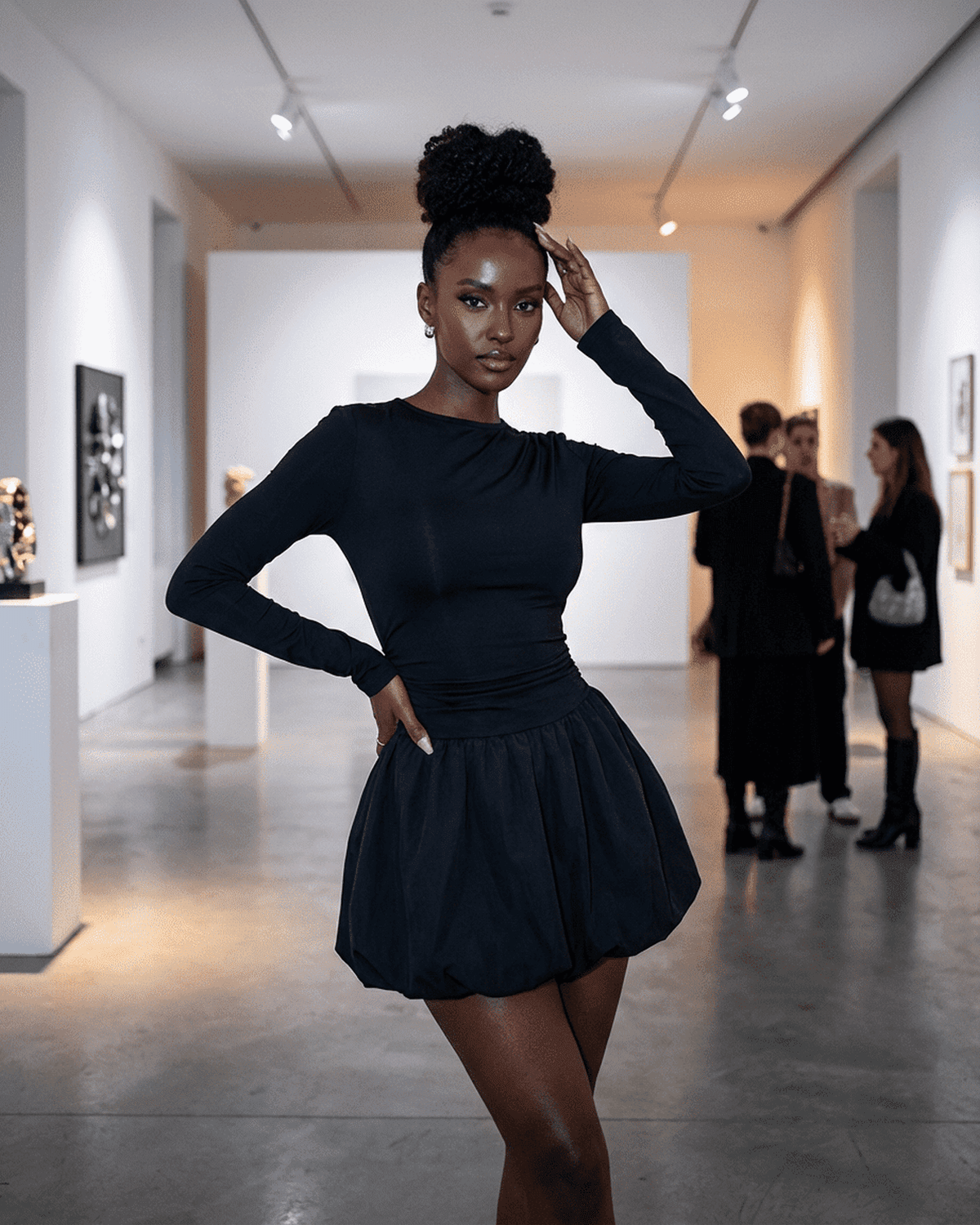 Elara Mini Dress by Lauven showcased in a fashion event, featuring a fitted stretchy silhouette and elegant tiered skirt.