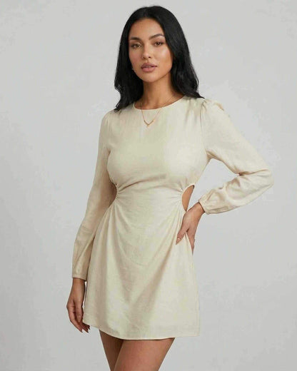 Elara Mini Dress by Lauven, featuring long sleeves, A-line silhouette, and stylish cut-out detail in a light color.