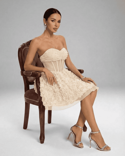 Elara Mini Dress by Lauven - Strapless floral pouf dress with corset bodice, featuring 3D flower details.