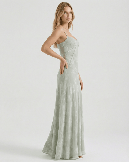 Eliara Maxi Dress by Lauven, showcasing a sage-green floral print and elegant sheer design, perfect for formal occasions.