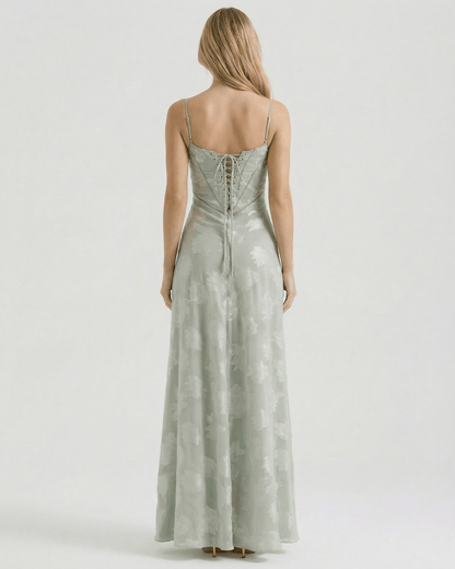 Back view of Eliara Maxi Dress by Lauven, featuring sheer floral print and lace-up detailing.