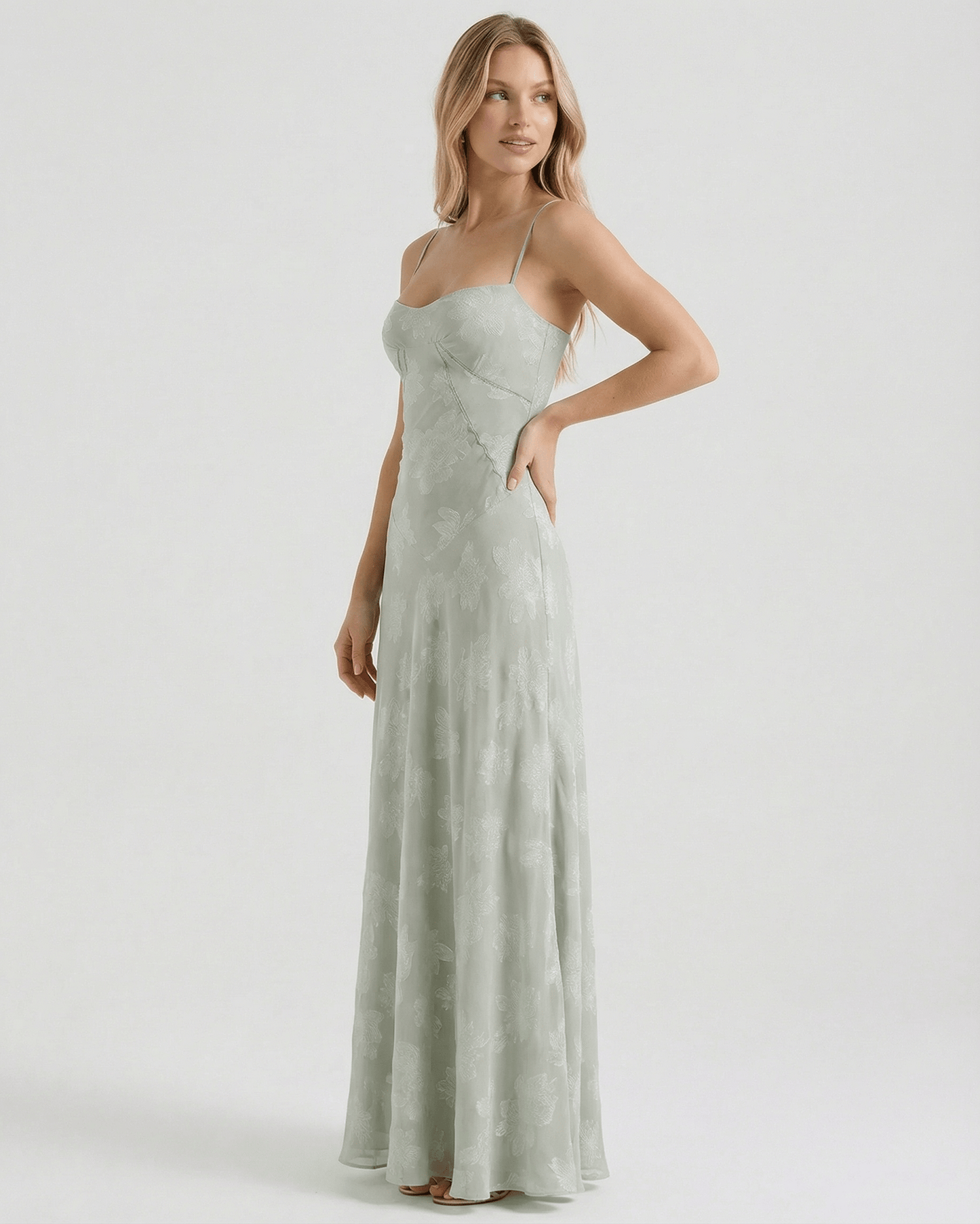 Eliara Maxi Dress by Lauven, elegant floral print maxi dress in sage green with sheer fabric and lace-up back.
