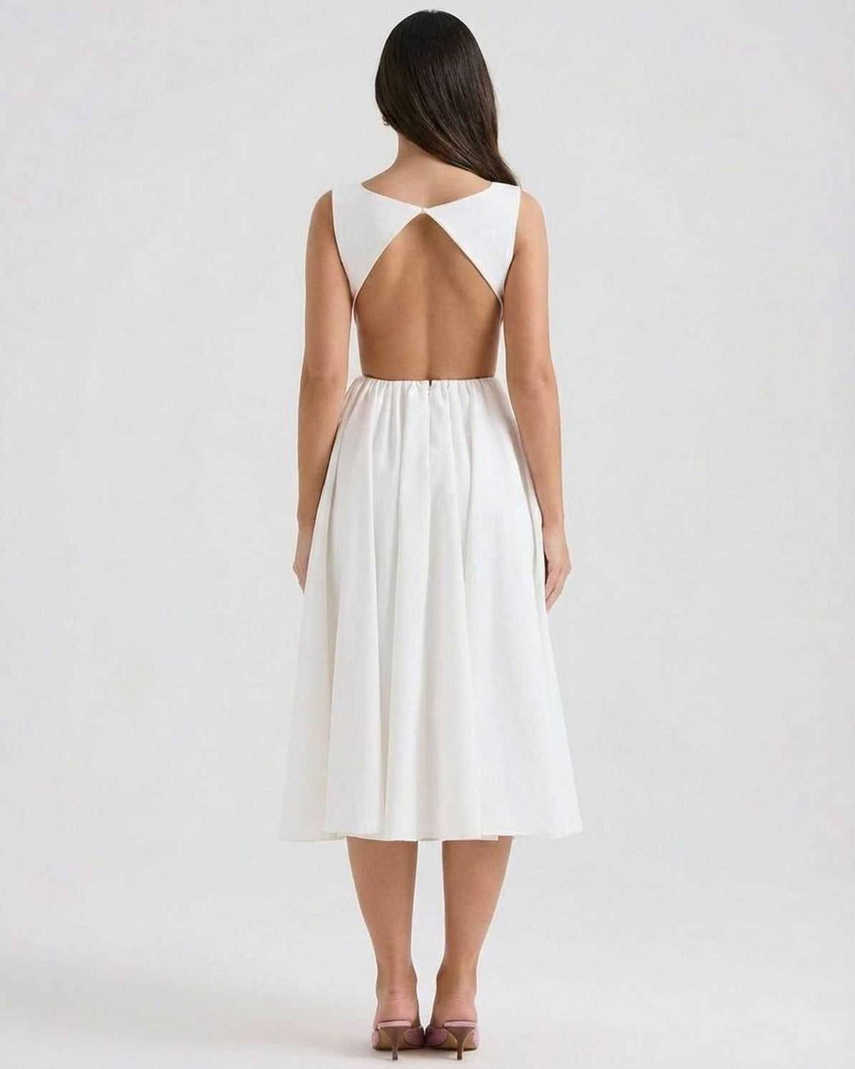 Elysia Midi Dress by Lauven, showcasing elegant A-line design with open back detail in white.