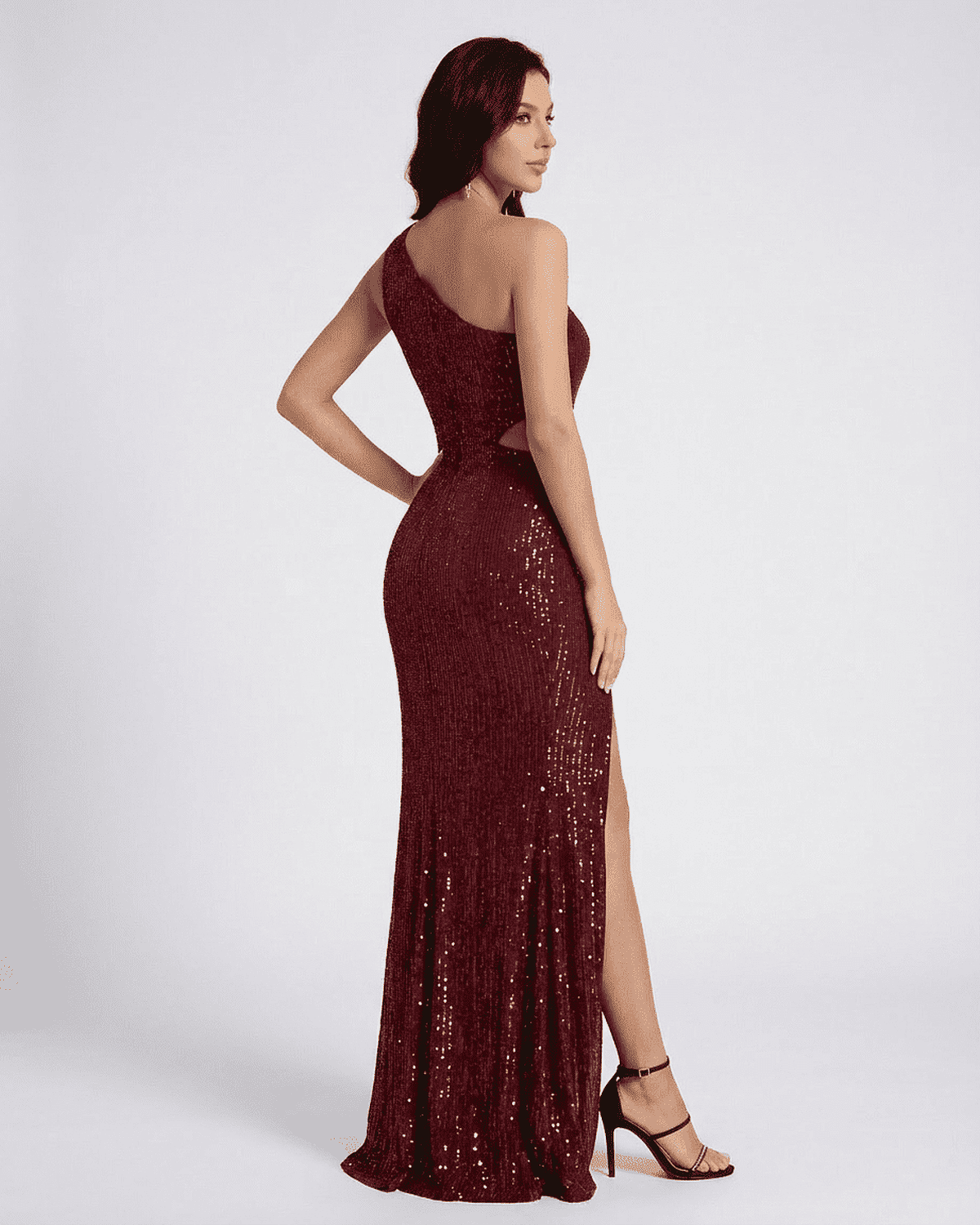Ember Maxi Dress by Lauven showcasing back view with sparkling sequins and a thigh-high slit.