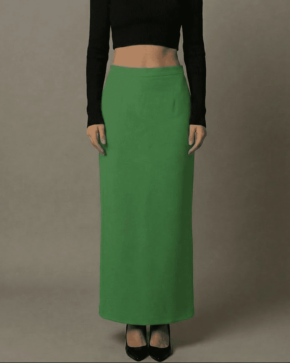 Emerald Maxi Skirt by Lauven, high-waisted style with a smooth green fabric and elegant slit for modern sophistication.