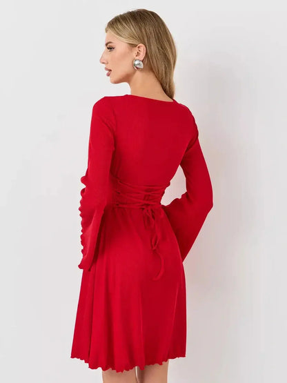 Flare Cutout Mini by Lauven, showcasing a romantic red dress with elegant bell sleeves and an A-line silhouette.
