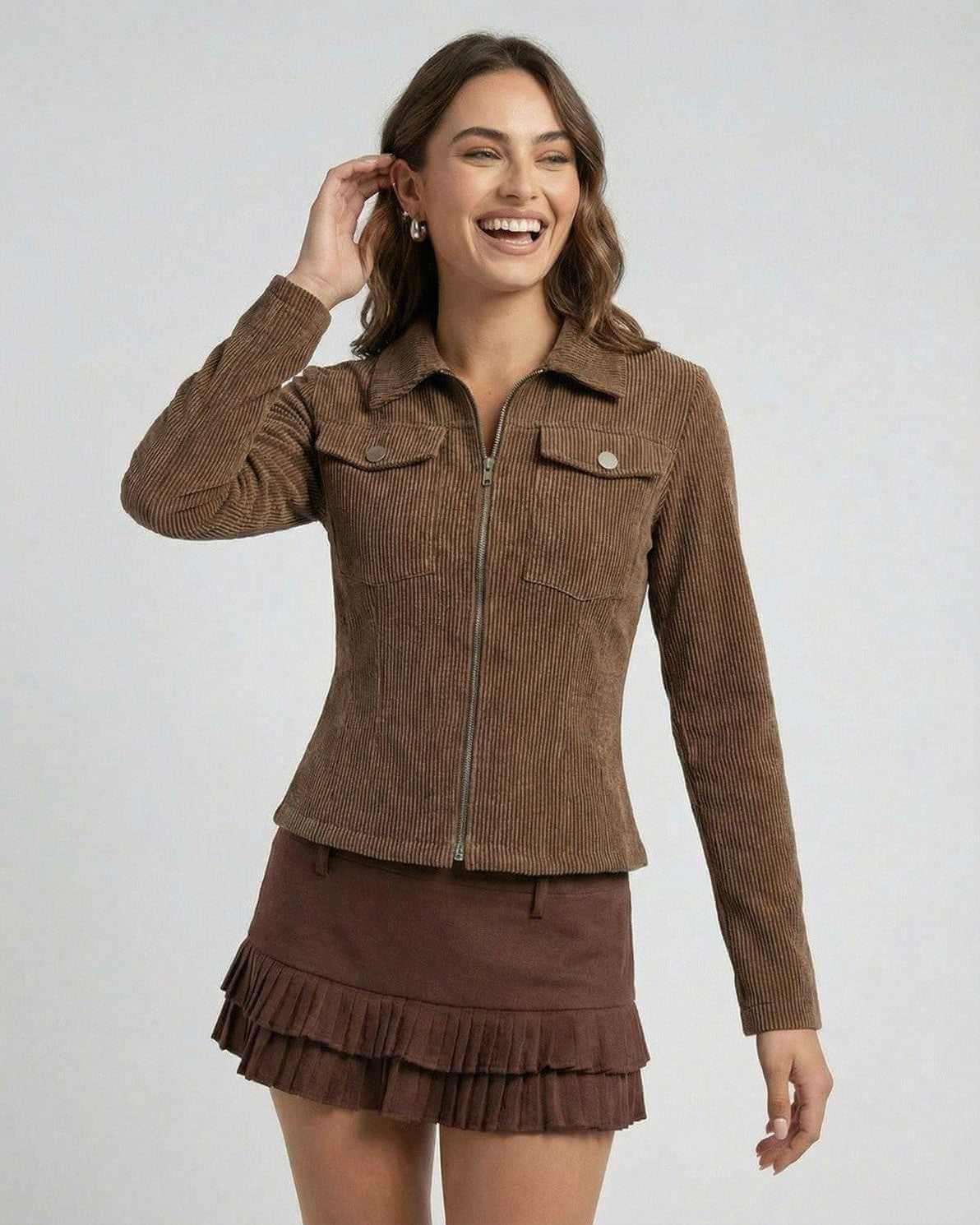 Women smiling in a Florence Jacket by Lauven, a stylish brown corduroy zip-up jacket, perfect for casual outings.