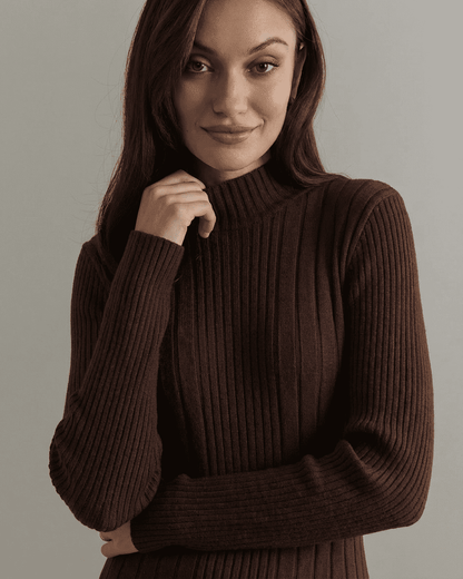 Florence Mini Dress by Lauven, showing the ribbed knit mock neck and long sleeves in a stylish close-up.