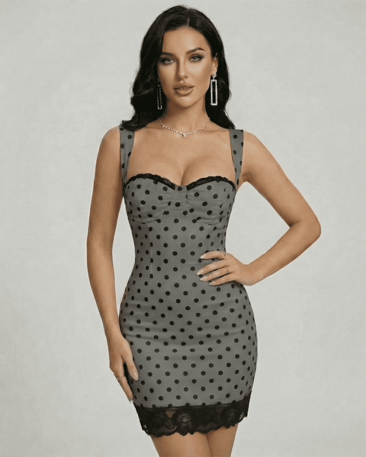 Graphite Mini Dress by Lauven featuring polka dots, lace trim, and a sculpted high waist.