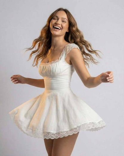 Isla Mini Dress by Lauven, featuring a slim fit, lace details, and playful skirt in elegant white.
