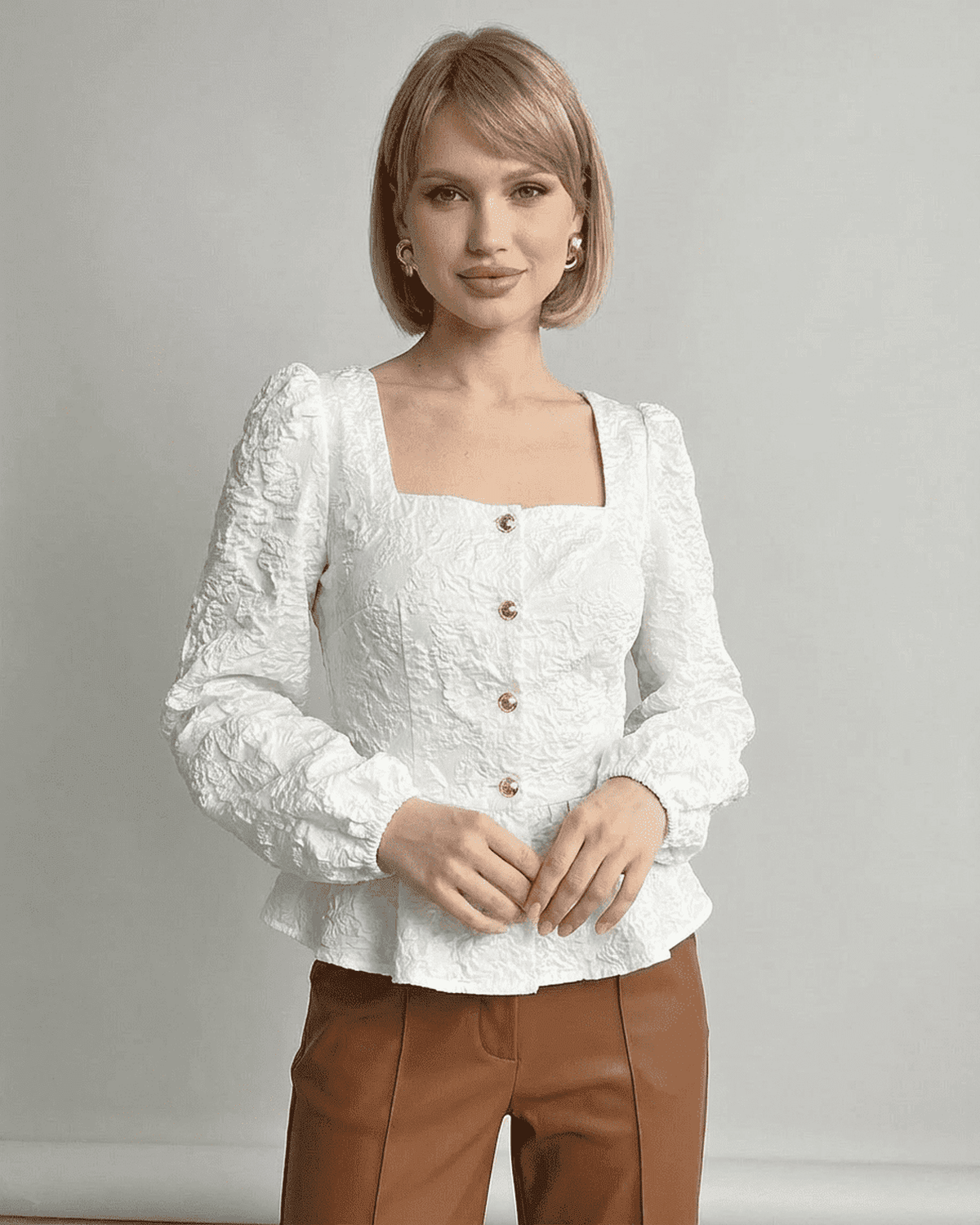 Ivory Corset Top by Lauven, jacquard square neck puff sleeve blouse with structured design.