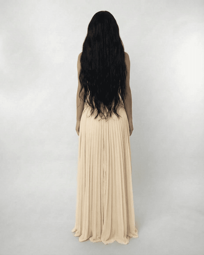 Ivory Maxi Dress by Lauven, showcasing a lace halter bodice and pleated maxi skirt from the back.