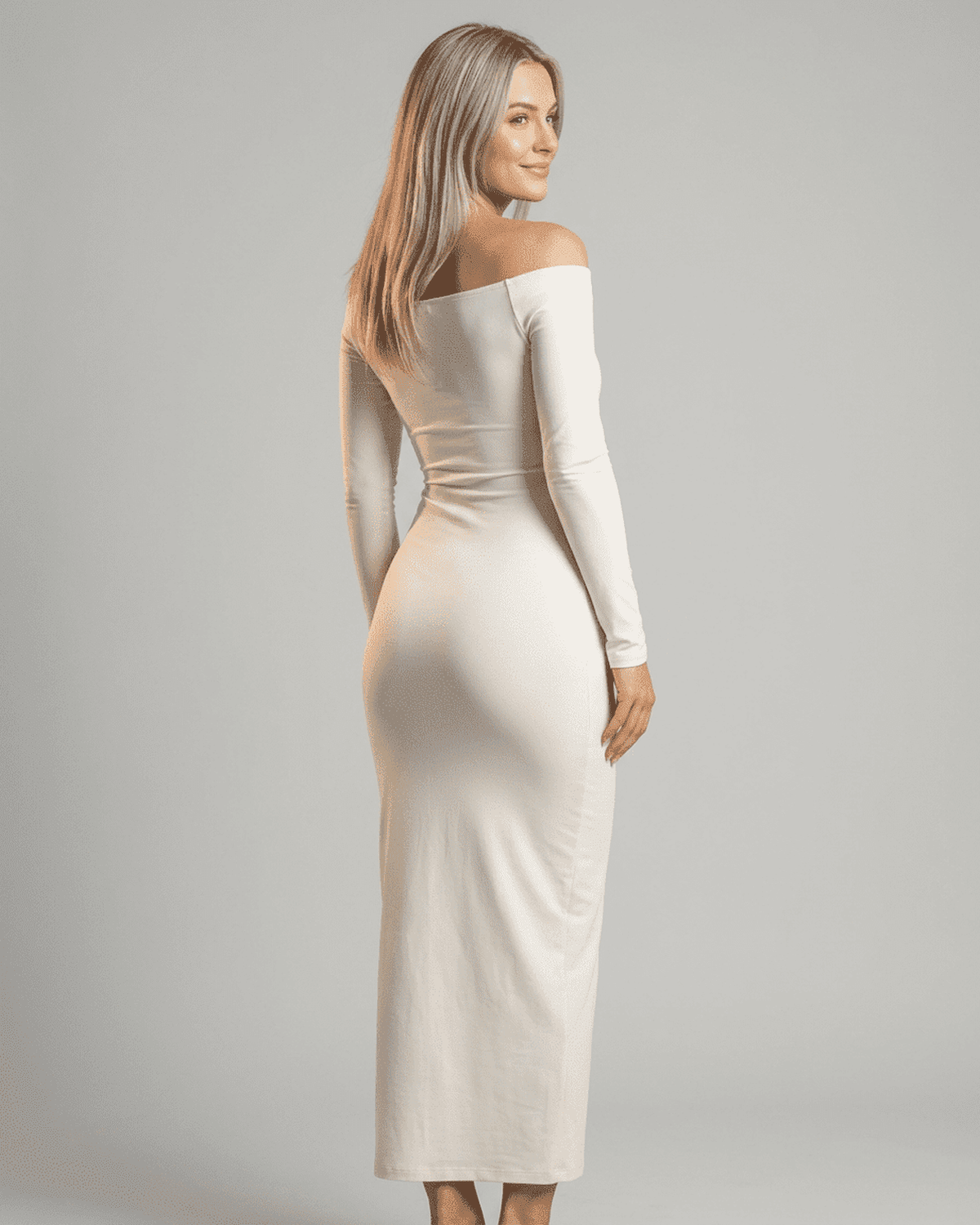 Ivory Maxi Dress by Lauven, featuring an off-shoulder slash neck and long sleeves, styled elegantly from the back.