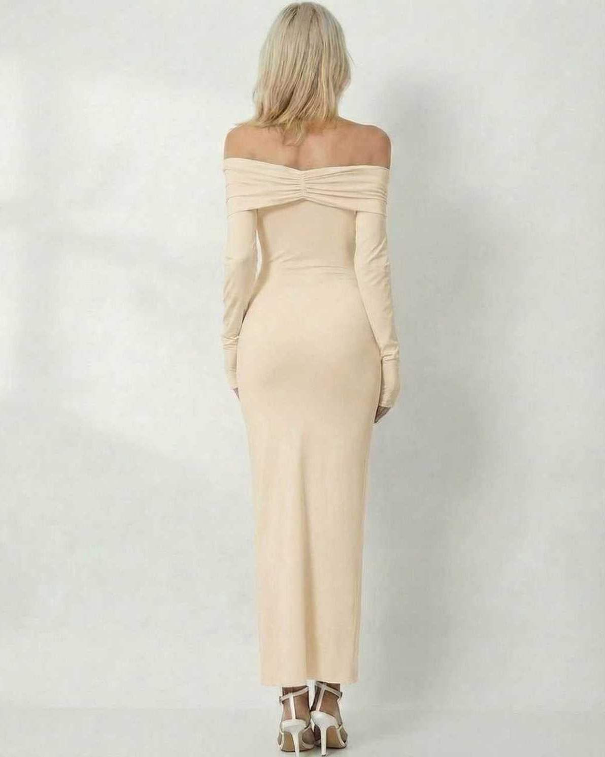 Ivory Maxi Dress by Lauven, showing the back view of a sleek off-shoulder sheath silhouette in soft ivory.