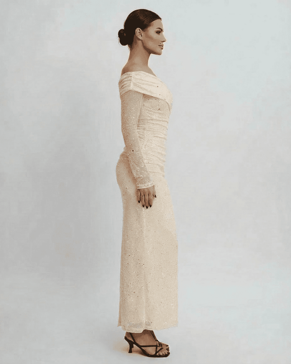 Ivory Maxi Dress by Lauven featuring an elegant off-the-shoulder design and shimmering sequin details.