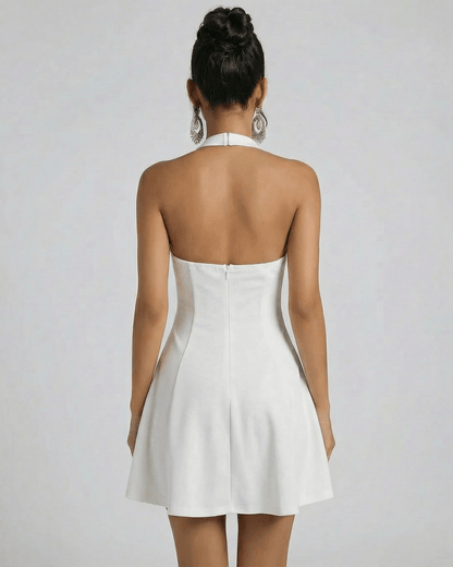 Ivory Mini Dress by Lauven, showcasing a smooth, flared silhouette and classic U-neckline from the back.