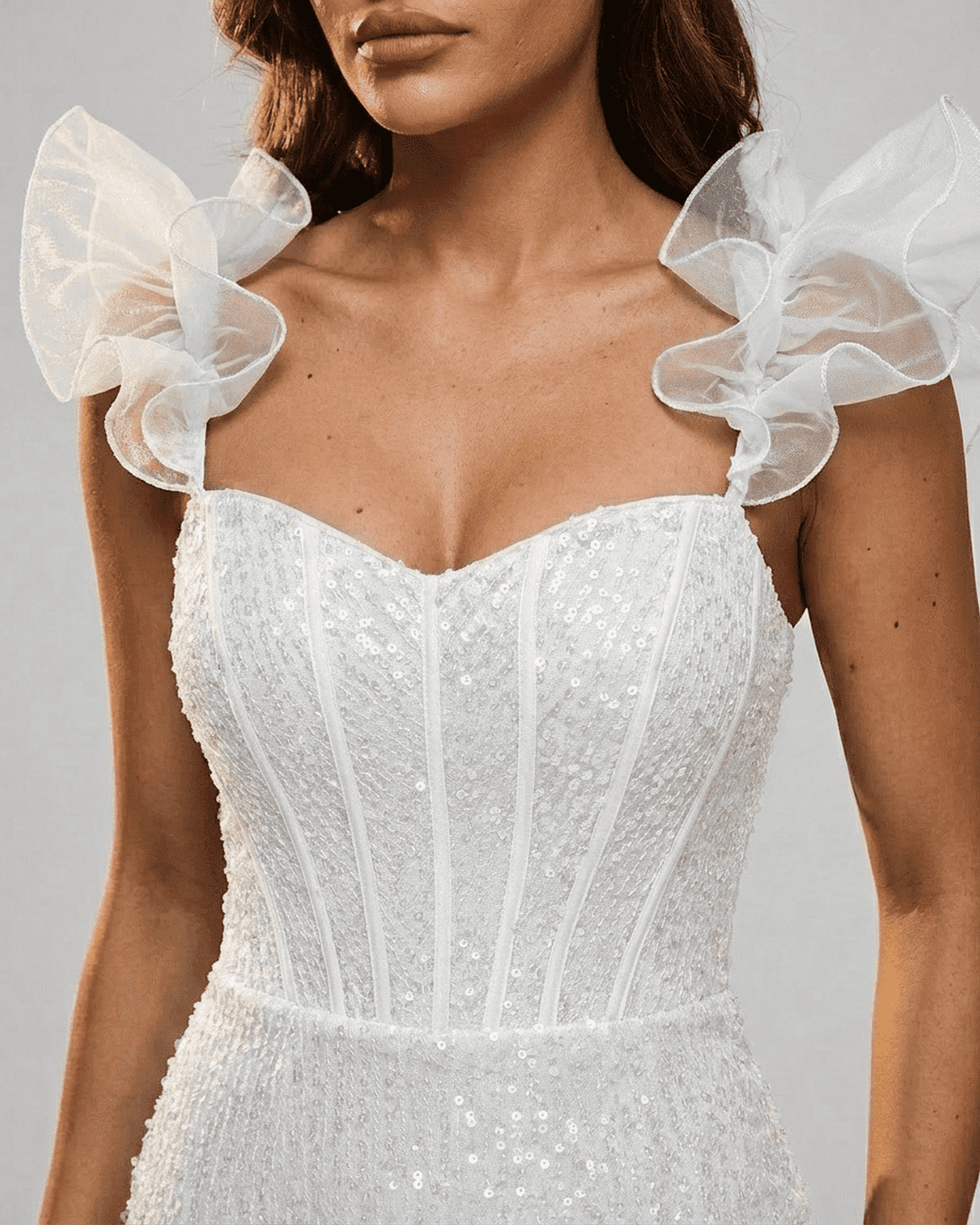 Ivory Mini Dress by Lauven featuring white sequin off-the-shoulder design with ruffle sleeves for a glamorous look.