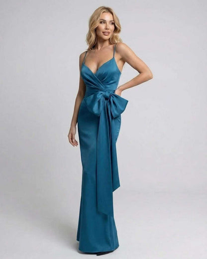 Laguna Maxi Dress by Lauven - Asymmetrical teal maxi dress with statement bow detail and elegant wrap-inspired bodice.