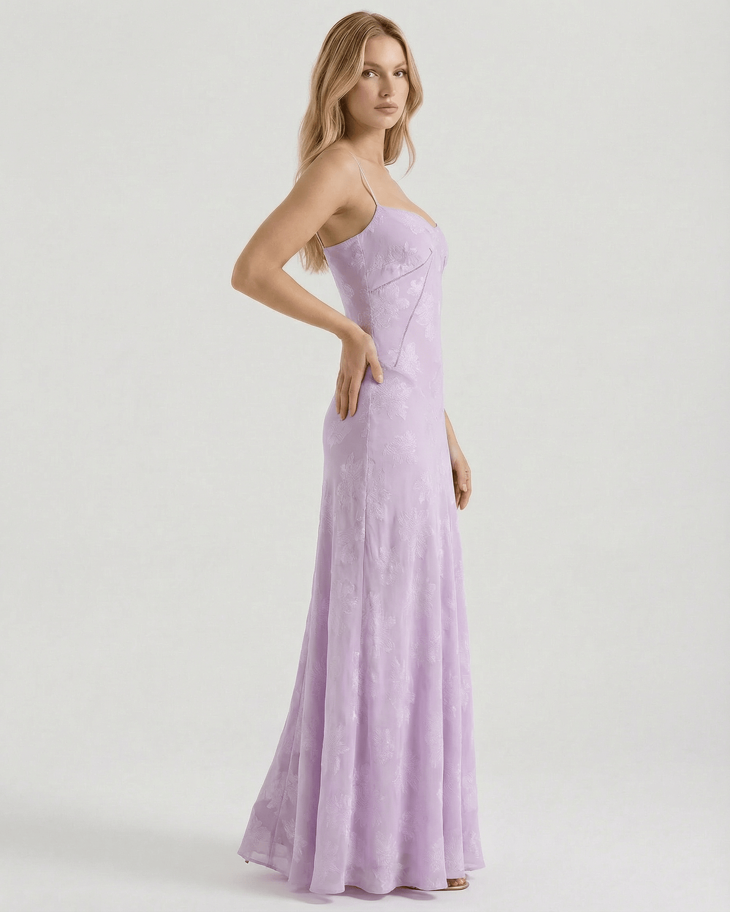 Liliora Maxi Dress by Lauven, showcasing a lavender floral print and sheer fabric with a sleek, elegant silhouette.