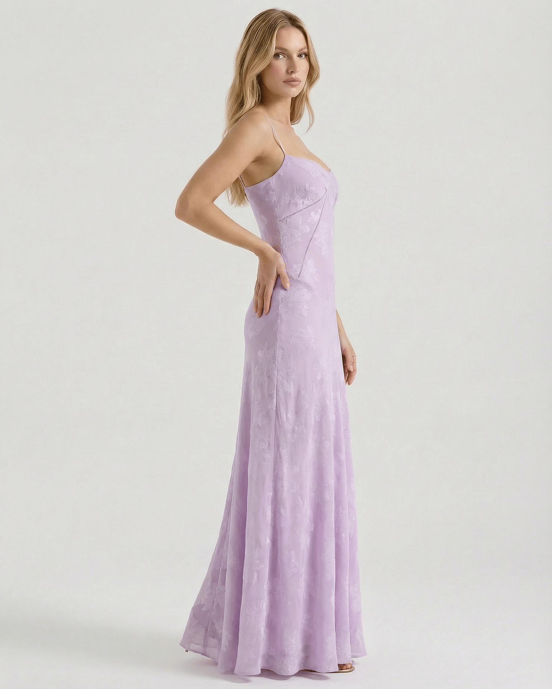 Liliora Maxi Dress by Lauven, showcasing a lavender floral print and sheer fabric with a sleek, elegant silhouette.