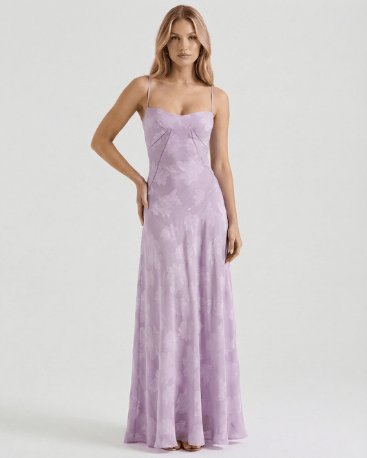 Liliora Maxi Dress by Lauven, featuring sheer fabric, lavender floral print, and elegant lace-up back design.