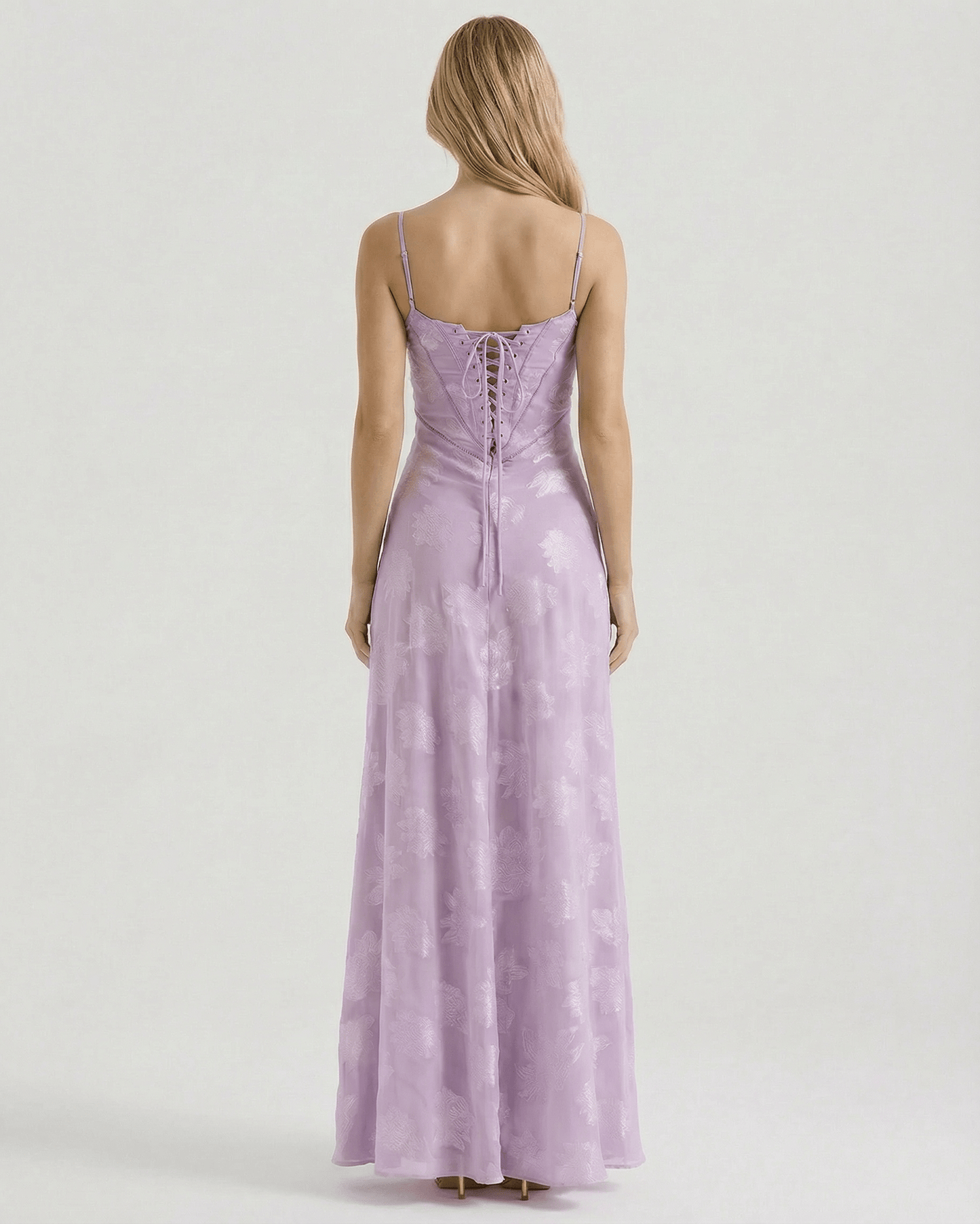 Liliora Maxi Dress by Lauven showcasing the elegant sheer lace-up back and floral print in soft lavender.