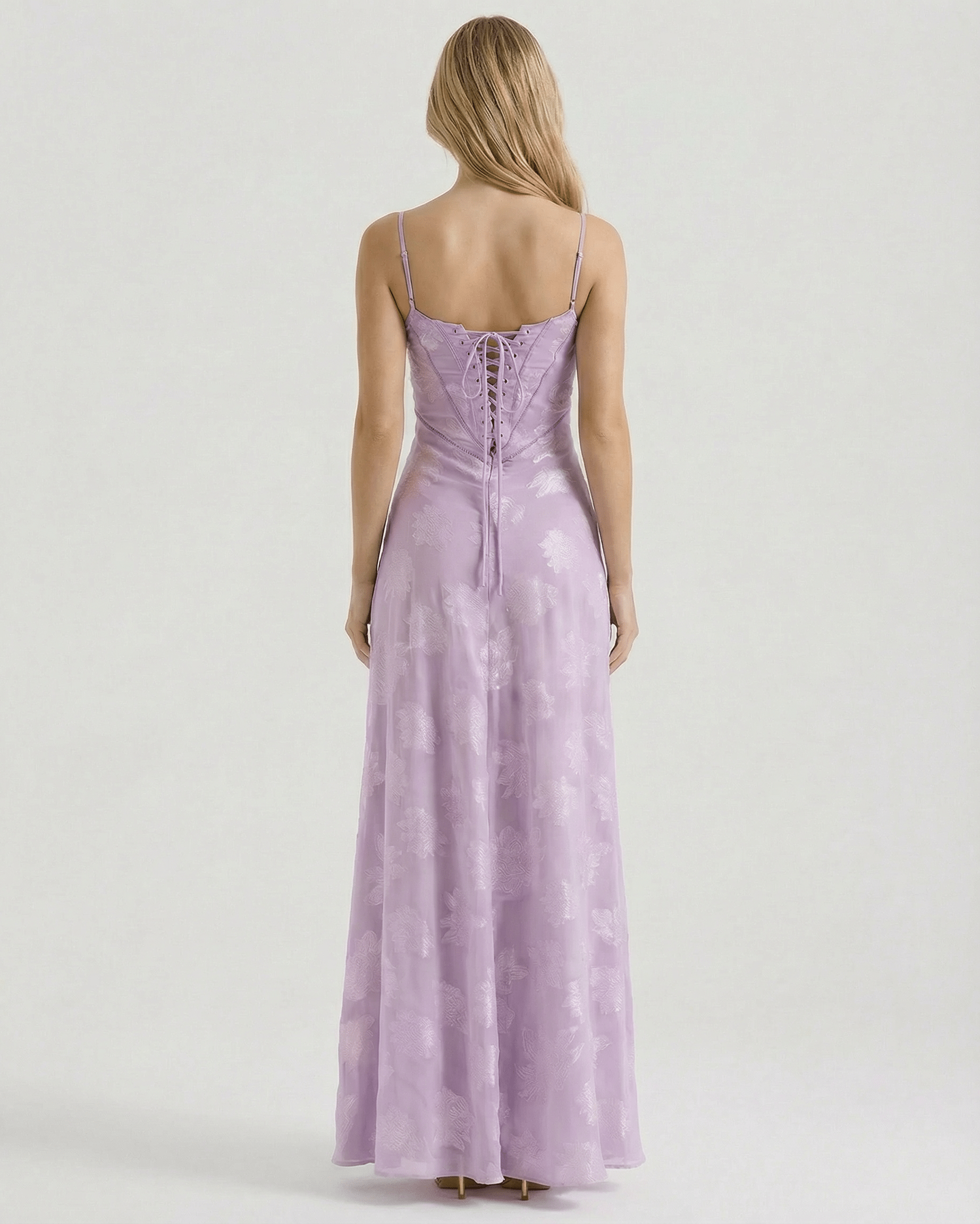 Liliora Maxi Dress by Lauven showcasing the elegant sheer lace-up back and floral print in soft lavender.
