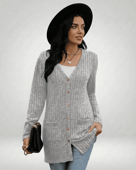 Luna Cardigan by Lauven, a longline button-front knitwear with a ribbed texture and V-neckline.